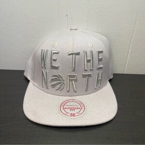 Mitchell & Ness NBA We The North, Toronto Raptors White Snapback Hat.